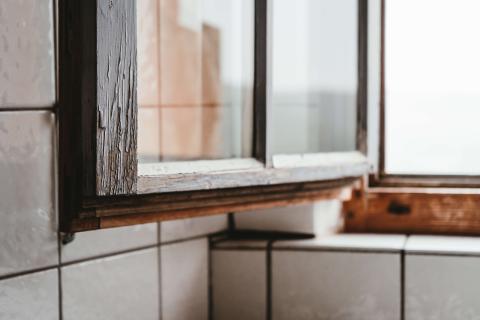 Old window frame in bathroom