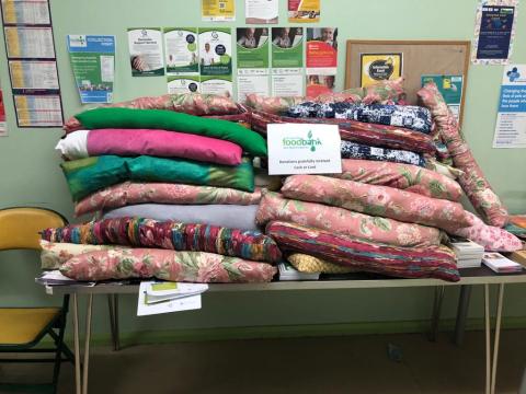 Draught excluders made by Pontypridd and District Friends of the Earth as part of the Warm Homes Day of Action