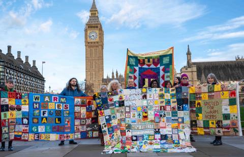Campaigners take their community quilts to Westminster